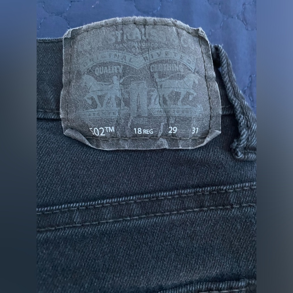 black Levi’s jeans